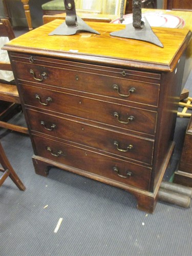Lot 347 - A George III mahogany chest of four long...