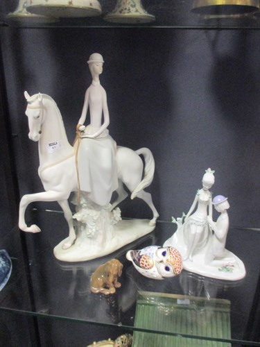 Lot 60 - A Lladro woman riding sidesaddle, Copenhagen...