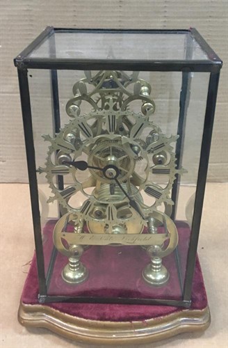 Lot 450 - A Victorian brass skeleton timepiece