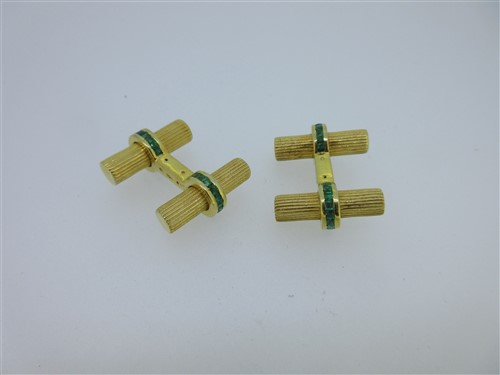 Lot 146 - A pair of emerald set baton cufflinks