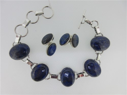 Lot 245 - A chain bracelet set with lapis lazuli together with a pair of lapis lazuli double-ended cufflinks