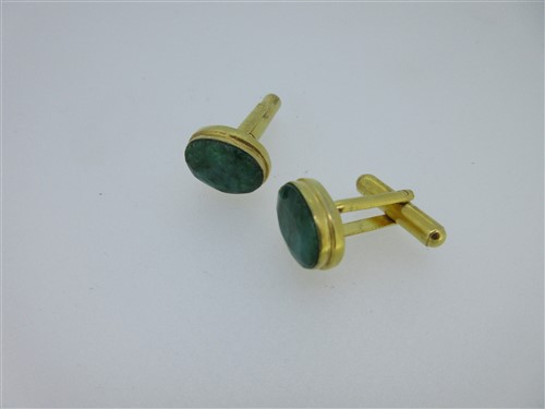 Lot 73 - A pair of single ended emerald cufflinks and a similar pair set with lapis lazuli