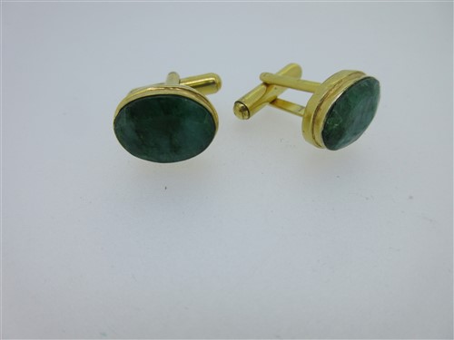 Lot 73 - A pair of single ended emerald cufflinks and a similar pair set with lapis lazuli