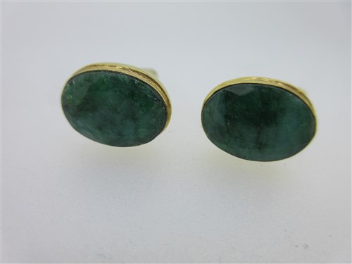 Lot 73 - A pair of single ended emerald cufflinks and a similar pair set with lapis lazuli