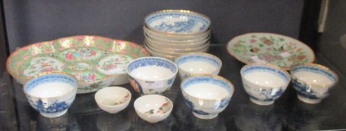 Lot 52 - Five Chinese blue and white tea bowls; and...
