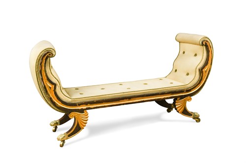 Lot 491 - A Regency faux rosewood and parcel gilt framed window seat