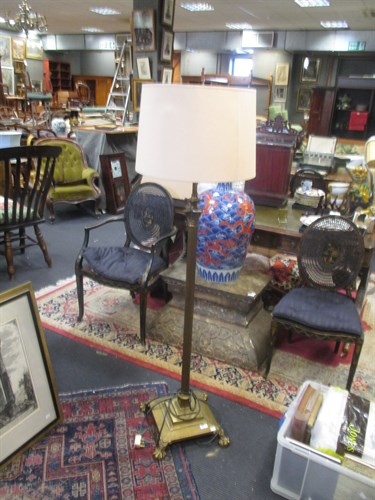 Lot 386 - A Brass Column Lamp on standard claw feet;...