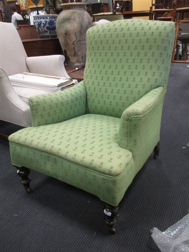Lot 414 - A Victorian green fabric upholstered armchair