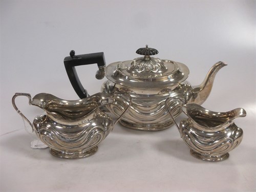 Lot 202 - A silver three-piece tea service