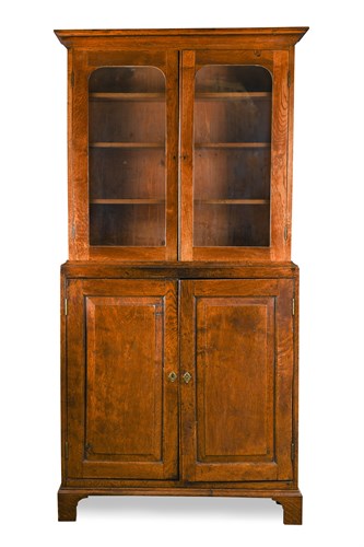 Lot 530 - An 18th Century oak panelled cabinet