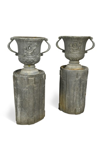 Lot 584 - A pair of  two handled lead garden urns