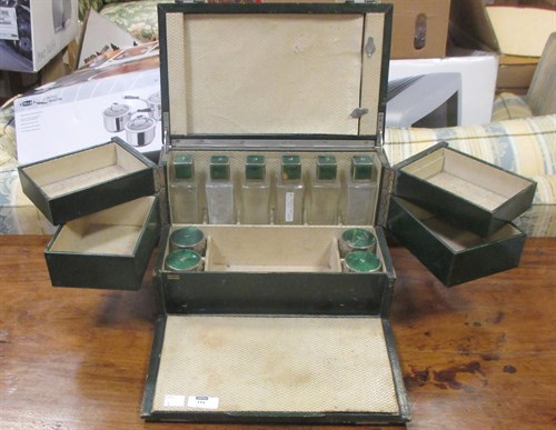 Lot 154 - A 1930's green leather dressing case, the...