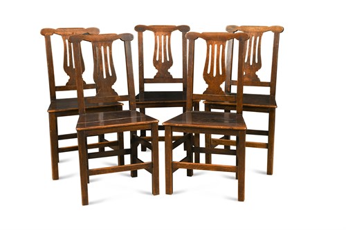 Lot 409 - A set of five George III oak farmhouse dining chairs