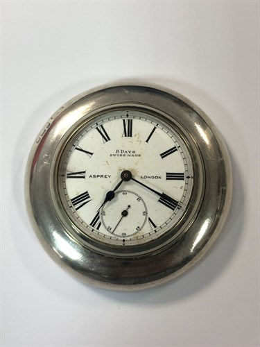 Lot 401 - Asprey - An Edwardian silver mounted 8 day desk timepiece
