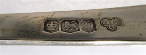 Lot 658 - A pair of George V silver asparagus tongs