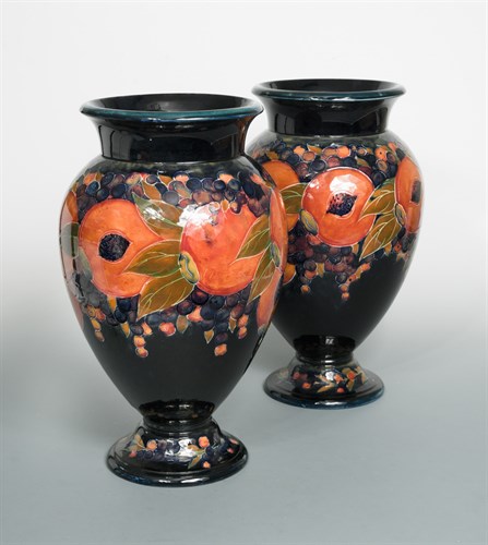 Lot 41 - A particularly large pair of Moorcroft Pomegranate pattern vases