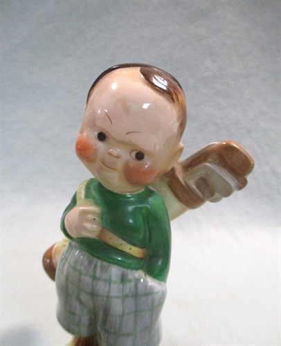 Lot 54 - A Shelley Mabel Lucie Atwell model of 'The Golfer'