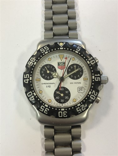 Lot 486 - Tag Heuer - A gentleman's stainless steel Formula 1 Panda dial chronograph wristwatch