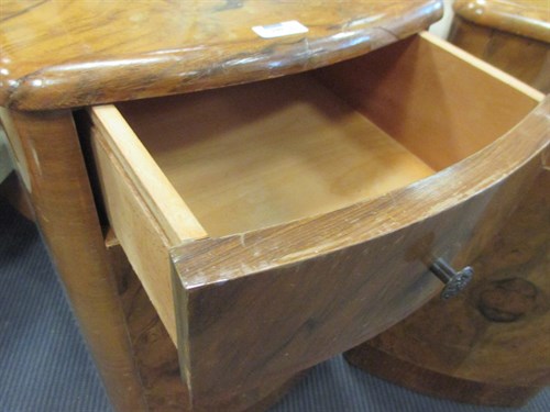 Lot 349 - A pair of Art Deco walnut bedside cabinets....
