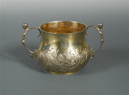 Lot 547 - A Charles II silver gilt two handled porringer