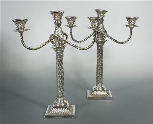 Lot 625 - A pair of Victorian silver three light metamorphic candelabra