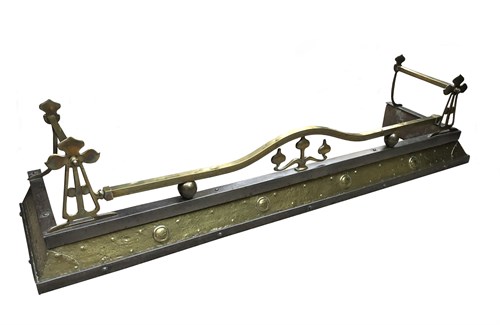 Lot 232 - An Art Nouveau brass and steel fender