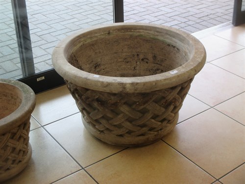 Lot 451 - A large pair of reconstituted garden urns with...