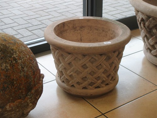 Lot 452 - A pair of reconstituted garden urns with...