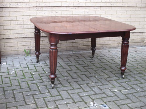 Lot 420 - A 19th Century mahogany extending dining table