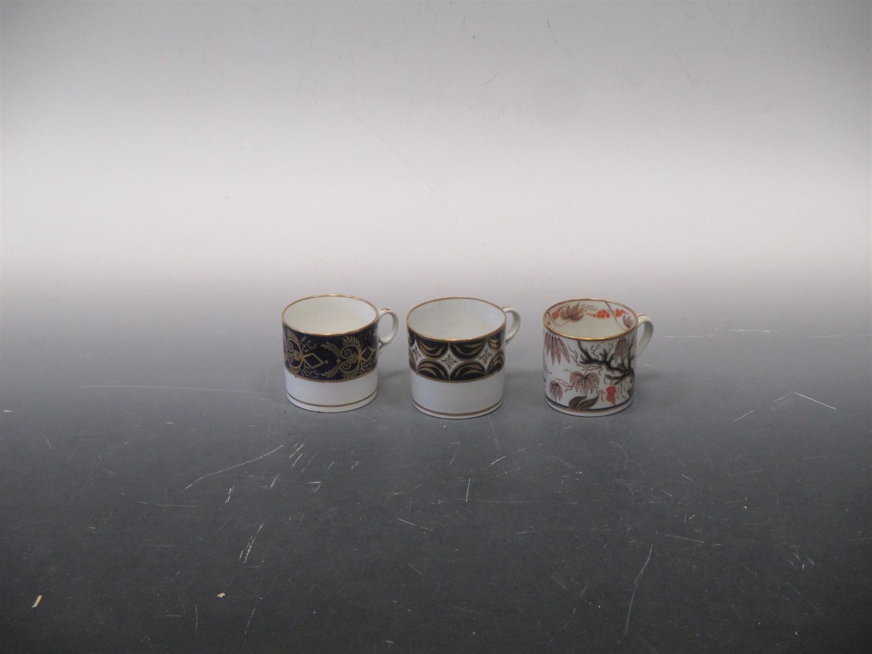 Lot 61 - A Regency Newhall coffee can and saucer from