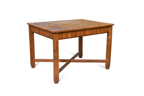 Lot 282 - An Art Deco parquetry decorated oak centre table