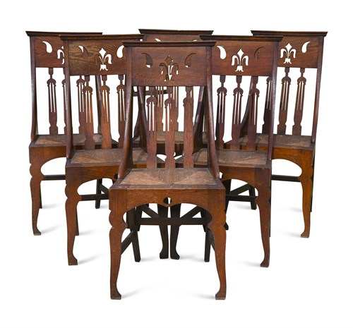 Lot 236 - A set of six Arts & Crafts oak dining chairs
