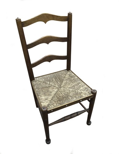Lot 238 - An Arts & Crafts rush seated child's chair