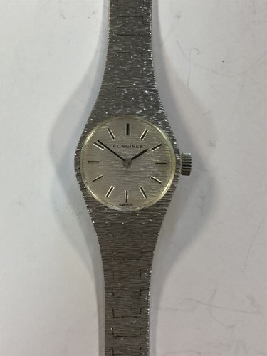 Lot 369 - Longines - A lady's Sterling silver wristwatch,...