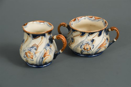 Lot 39 - A MacIntyre Moorcroft Florian Ware milk jug and sugar bowl