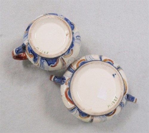 Lot 39 - A MacIntyre Moorcroft Florian Ware milk jug and sugar bowl