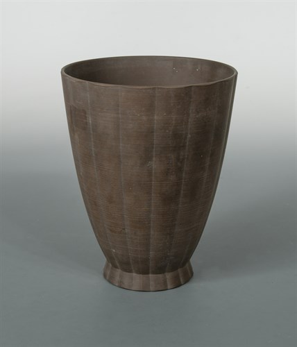 Lot 75 - Keith Murray for Wedgwood, a brown basalt vase