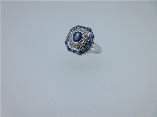 Lot 199 - An Art Deco style sapphire and diamond ring