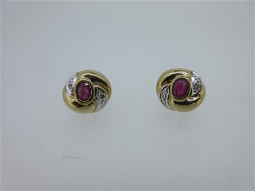 Lot 224 - A pair of gold, ruby and diamond earstuds