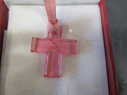 Lot 154 - Baccarat: a pink crystal glass pendant cross...