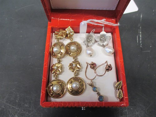 Lot 156 - An opal pendant and four pairs of earrings