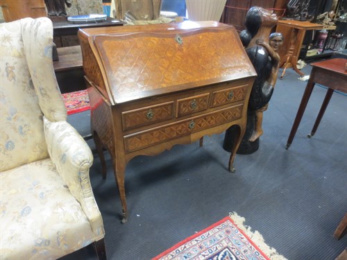 Lot 374 - A French Louis XV style parquetry bureau de...
