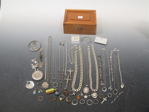Lot 141 - A box containing a large quantity of silver...