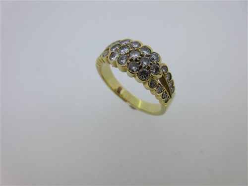 Lot 69 - A modern diamond band ring