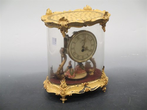 Lot 29 - A burrwood mantal timepiece with French drum...