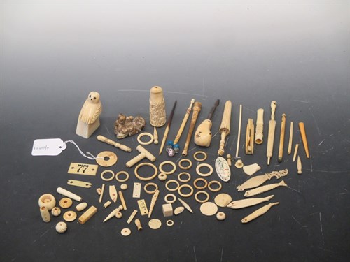 Lot 106 - A collection of vintage ivory and bone items...