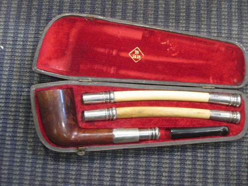 Lot 100B - A cased pipe with silver fittings and...