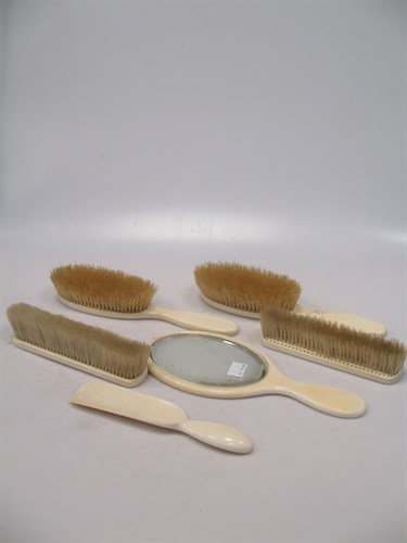 Lot 105 - An ivory dressing table set circa 1940,...