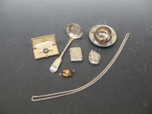 Lot 180 - A collection of silverware including a sifting...