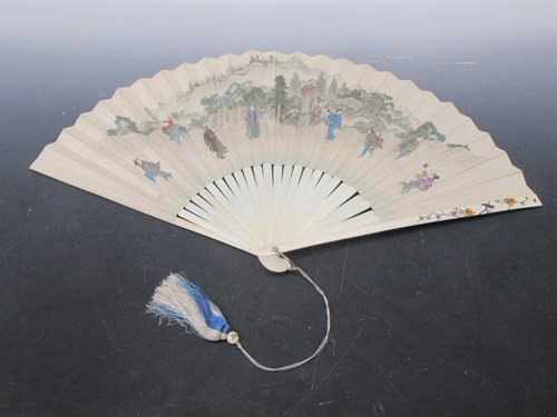 Lot 90 - A large ivory fan